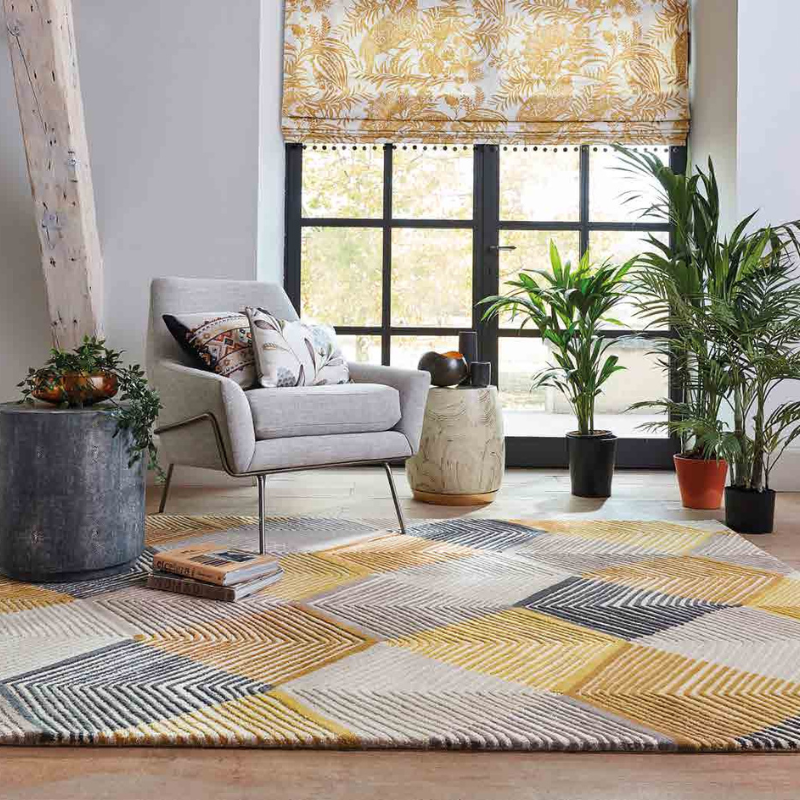 yellow, black, and gray rug by Harlequin
