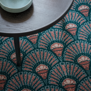 Lifestyle Carpet Natural Carpet Material Deco Blush in blues and reds.