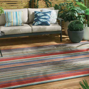 Colourful stripe patterned rug by Harlequin