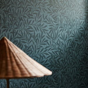 Emery Walker Wallpaper Morris & Co Wallpaper - very dark blue leafy branches on a lighter blue background wallpaper.