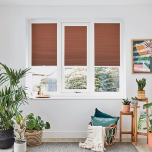 Rol-Lite Perfect Fit Cellular Astral Rust Blinds - rusty red blinds situated perfectly within three individual window frames.