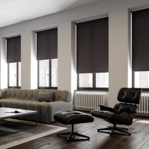 Rol-Lite Scope Impact Blinds - four large windows with plain black roller blinds.